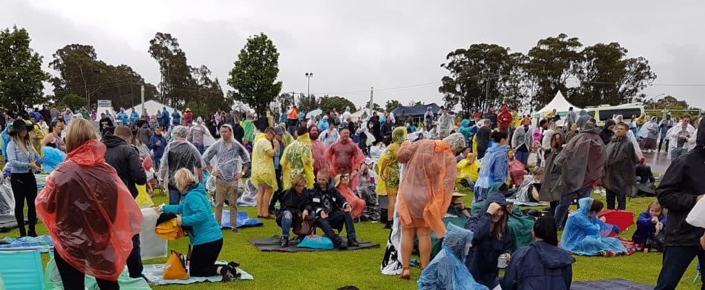a sea of ponchos on a wet Hunter Valley concert weekend