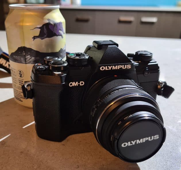 Olympus EM5 Mark III with 330ml can for size comparison