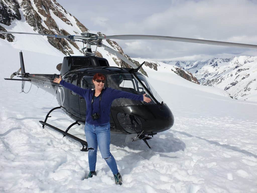 Me standing in front of the helicopter which has just flown me to the top of the Tasman Glacier